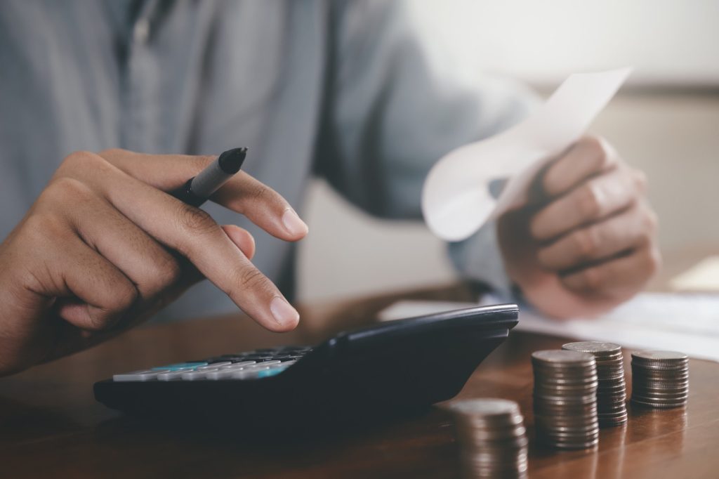 Closeup of an accountant using a calculator